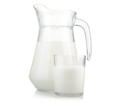 Jug and glass of milk isolated on white background