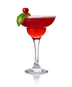 Glass of alcohol cocktail with lime and cherry isolated on white background