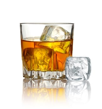 Glass of whiskey and ice isolated on white background
