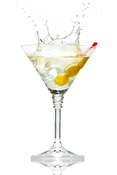 Olive splashing on martini glass isolated on white background