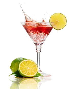 Red martini cocktail with splash and lime isolated on white 