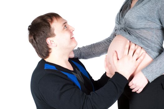 Shot of pregnant woman and her husband isolated on white