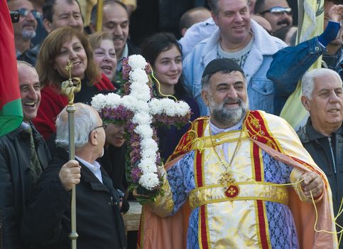 QASER EL YAHUD , JORDEN - JAN 19 : Syrian Orthodox Christians participates in the annual baptising ceremony during the epiphany at Qaser el yahud , Jorden in January 19 2012