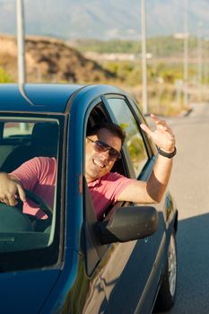 Driver wildly gesticulating out of the window of his car