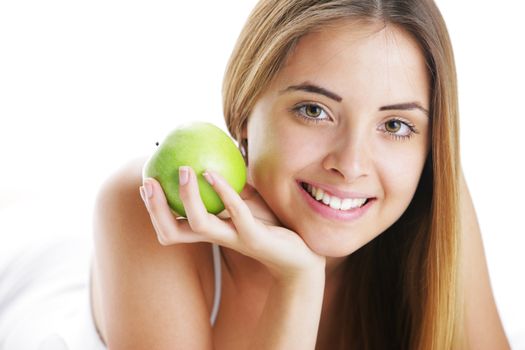 Smiling Young Woman Holding Apple, close up