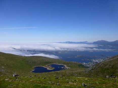 Blue sky, but fog over Aalesund