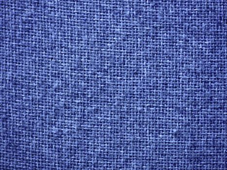 Blue burlap fabric closeup for texture and backgrounds