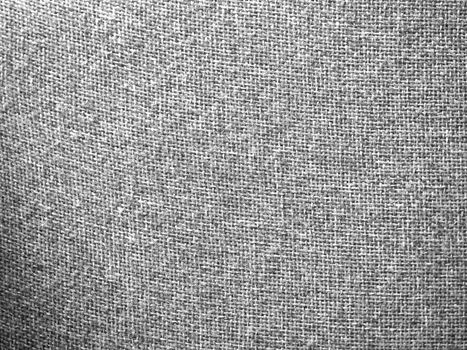 Gray burlap fabric closeup for texture and backgrounds