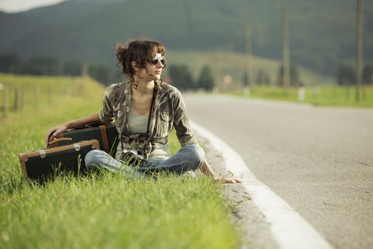 A young woman on the side of the road.Copy space