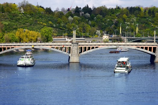 Vltava river and boats in Prague, Czech Republic