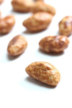 isolated roasted almonds