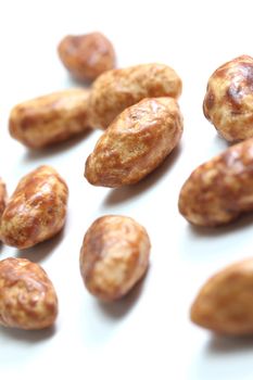 isolated roasted almonds