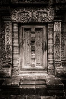 Amazing pink temple of Banteay Srei false stone doorway.