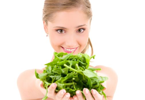 picture of happy woman with spinach over white