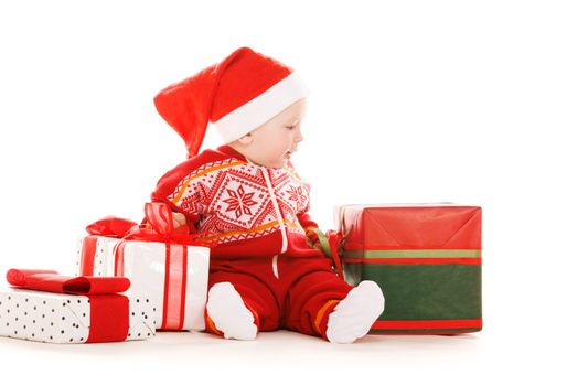 santa helper baby with christmas gifts over white