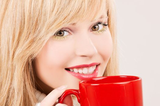 picture of happy teenage girl with red mug