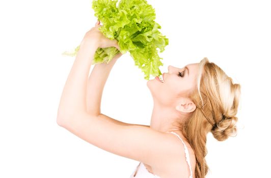 picture of happy woman with lettuce over white