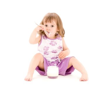 picture of little girl eating yogurt over white