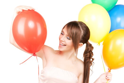 happy teenage girl with balloons over white