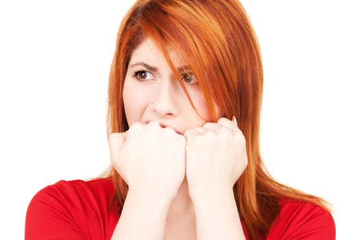 picture of unhappy redhead woman over white