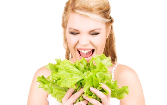 picture of happy woman with lettuce over white