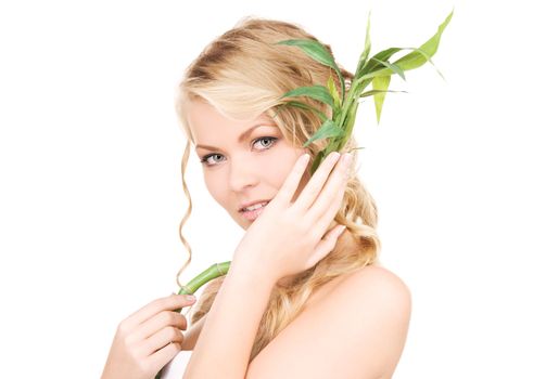 picture of woman with bamboo over white