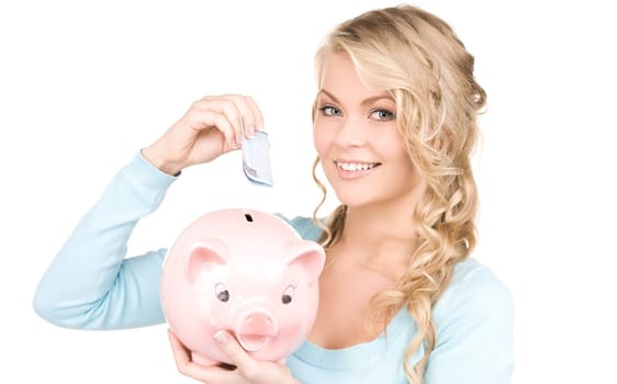 picture of lovely woman with piggy bank and money