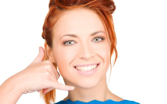 picture of lovely woman making a call me gesture