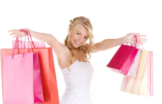 happy woman with shopping bags over white