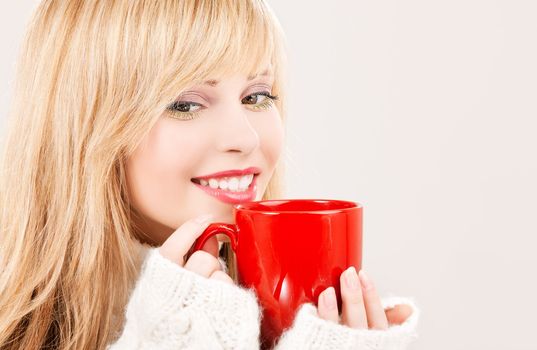 picture of happy teenage girl with red mug