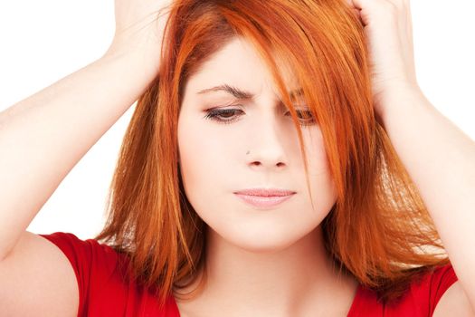 picture of unhappy redhead woman over white