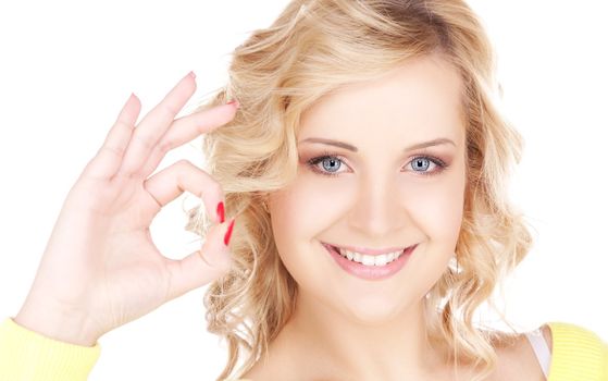 bright picture of lovely blonde showing ok sign