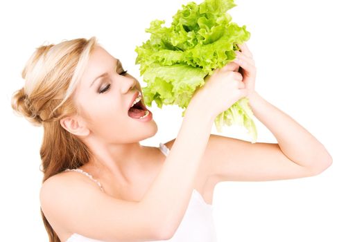 picture of happy woman with lettuce over white