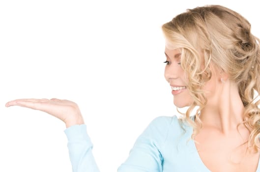 beautiful woman showing something on the palm of her hand