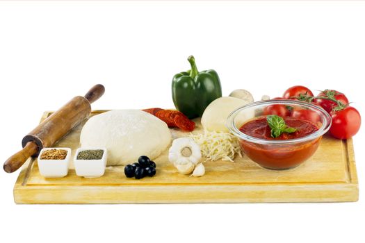 preparation of ingredients to make pizza isolated on white background