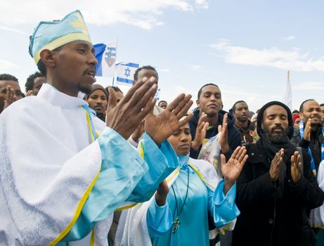 QASER EL YAHUD , ISRAEL - JAN 19 : Unidentified Ethiopian orthodox Christians  participates in the baptising ritual during the epiphany at Qaser el yahud , Israel in January 19 2012