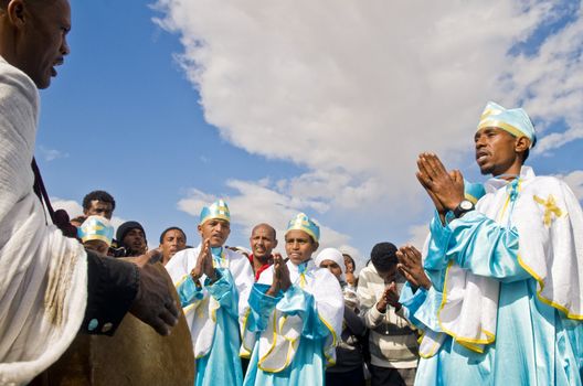 QASER EL YAHUD , ISRAEL - JAN 19 : Unidentified Ethiopian orthodox Christians  participates in the baptising ritual during the epiphany at Qaser el yahud , Israel in January 19 2012