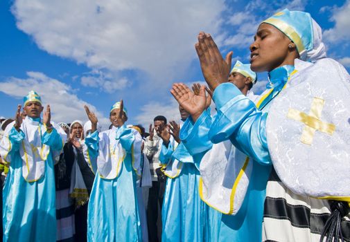 QASER EL YAHUD , ISRAEL - JAN 19 : Unidentified Ethiopian orthodox Christians  participates in the baptising ritual during the epiphany at Qaser el yahud , Israel in January 19 2012