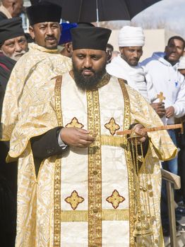 QASER EL YAHUD , ISRAEL - JAN 19 : Ethiopian Orthodox priests participates in the annual baptising ceremony during the epiphany at Qaser el yahud , Israel in January 19 2012