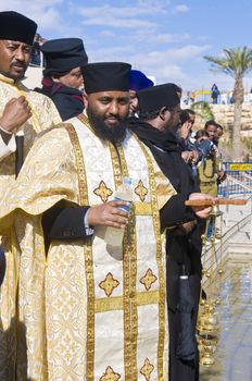 QASER EL YAHUD , ISRAEL - JAN 19 : Ethiopian Orthodox priests participates in the annual baptising ceremony during the epiphany at Qaser el yahud , Israel in January 19 2012