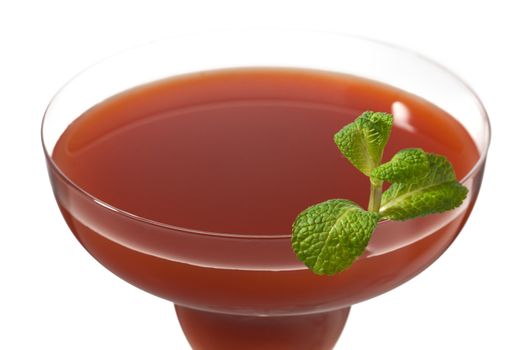 cropped image of strawberry juice in martini