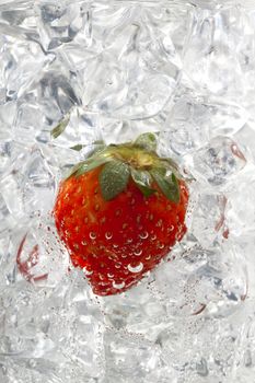 image of strawberry on ice cubes on a white background