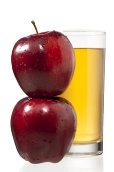 stack of apples and juice glass isolated on white background