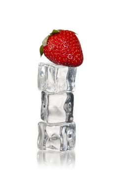stack of ice cubes with strawberry on top on a white background
