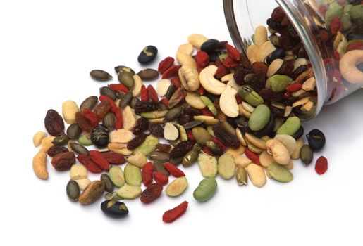 organic mixed nuts and dry fruits on white background