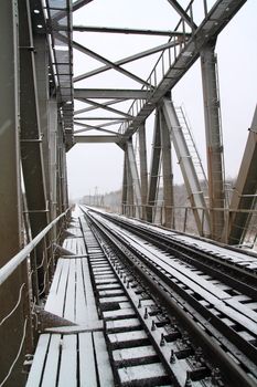 railway bridge through freeze river