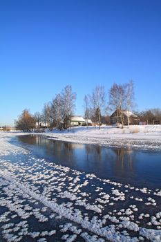 winter village on coast river