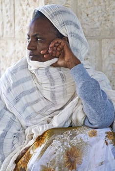 QASER EL YAHUD , ISRAEL - JAN 19 : Unidentified Ethiopian orthodox Christian woman participates in the baptising ritual during the epiphany at Qaser el yahud , Israel in January 19 2012