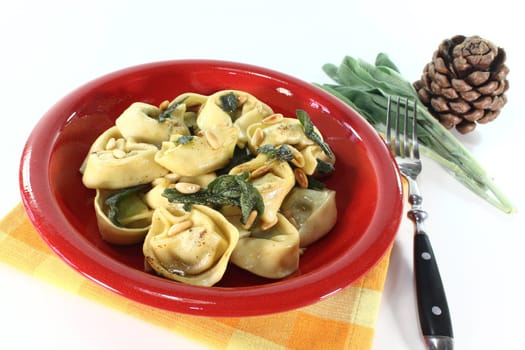 stuffed tortellini with sage butter and fresh pine nuts