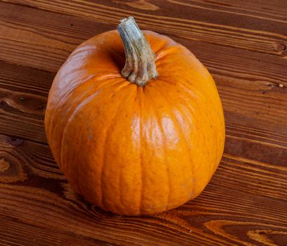 Perfect Pumpkin isolated on Wooden background